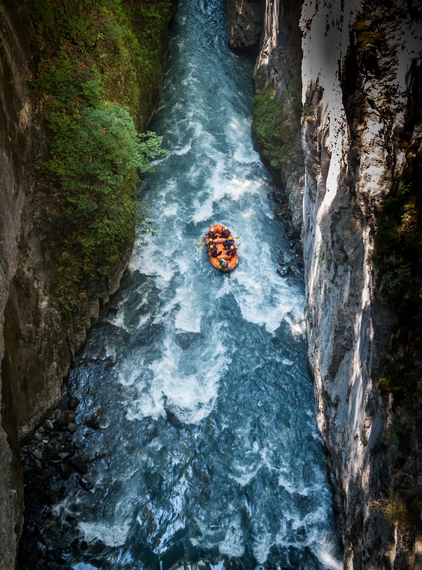 Rafting through a river canyon